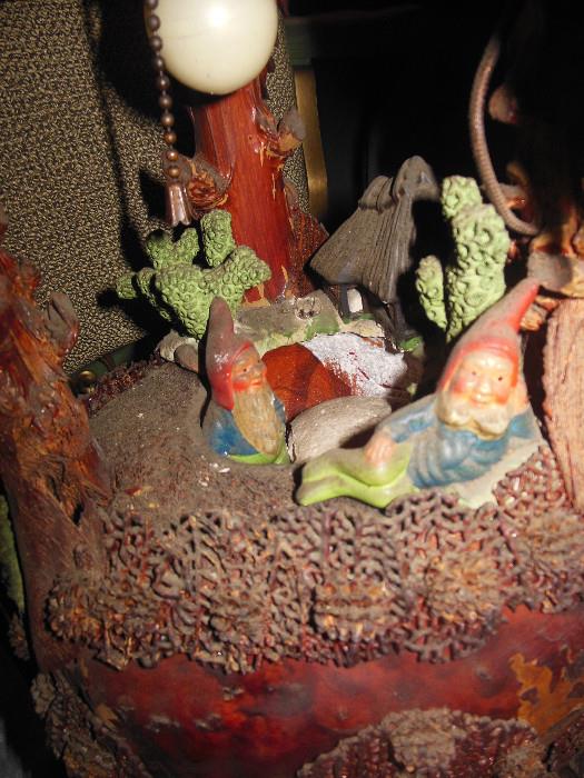 Gnomes inside lamp.