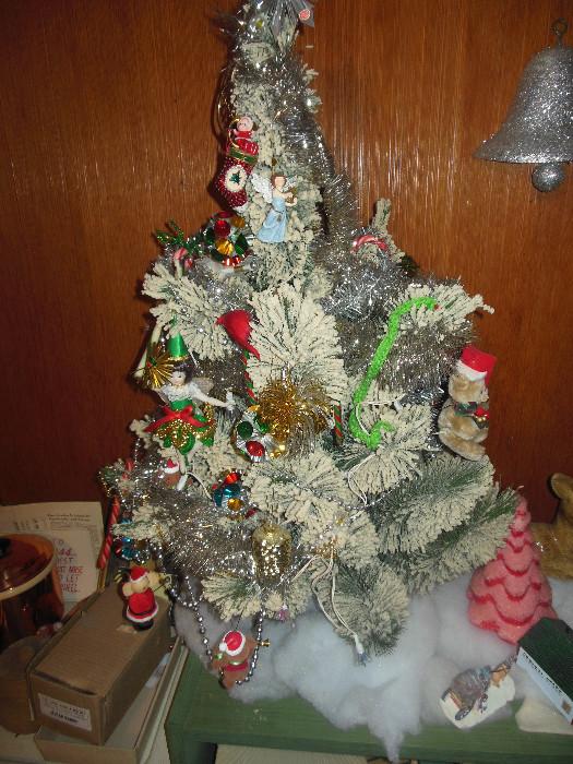 Faux Bottle Brush..Ornaments are vintage.We have box that tree came in