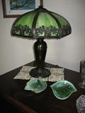 Signed Miller bronze lamp with green slag glass shade.