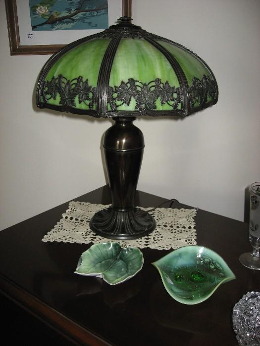 Signed Miller bronze lamp with green slag glass shade.