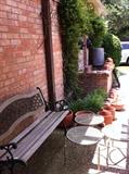               outdoor furniture & many clay pots