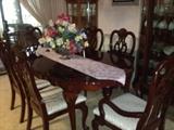highly laquered dining room table and chairs