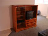 Entertainment center. Approx 5 ft wide. And 2 Televisions available.