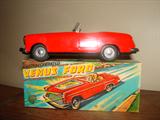 Venus Ford tin litho friction toy - MIB - "with lighted visible piston action" -
original price of $.88 at Lvingstons.