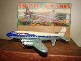 United Airlines tin litho- a couple of fine paint scratches to body, otherwise MIB - a DC7 Mainliner - original price $.88 at Livingston's