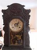 Waterbury mantel clock - check out the gingerbread and the pendulum is ornate!