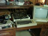 Commodore 64 with joy stick, screen, games, and keyboard