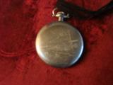 Backside of Remington pocket watch