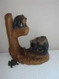 Carved bears with glass eyes - Mama with fish and cub up a tree