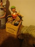 Carved wood stoppers - Mechanical Fiddler