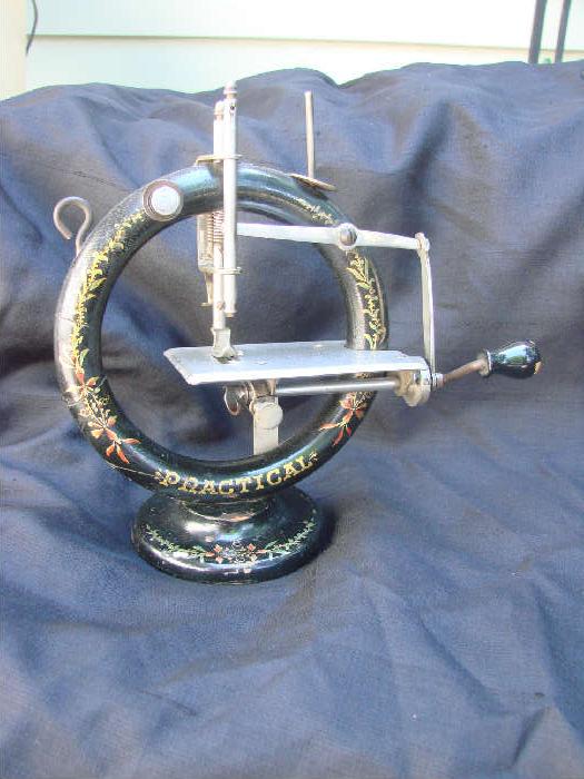 Antique child's sewing machine - very ornate and in excellent condition
