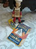 Occident flour jointed ad figure, Quaker corn meal paper