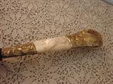 Mother of pearl and gold wash parasol handle