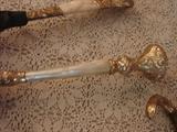 Gold washed with mother of pearl parasol handle