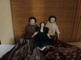 China head dolls in antique dress