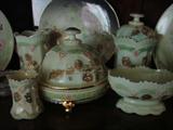 Custard glass covered butter dish, creamer, sugar, toothpick, and relish