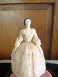 Jointed wooden doll in original dress - she is just over 6 inches tall with pin joints - probably 1840-1860.