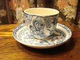 Blue transfer Punch & Judy cup & saucer
