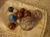 Clay and glass marbles - the shooters have seen better days