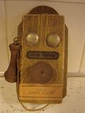 Tiny cardboard telephone requesting a call to Santa Clause