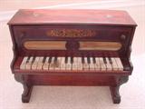 Schoenhut upright piano - we have the baby grand in about the same period