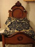 Victorian high back doll bed in period bedding