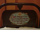 Metal doll bed with prayer for dolly's sleep in enamel - the footboard is equally sweet