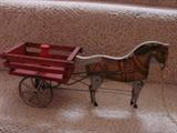 Cart being pulled by litho horse on tin legs