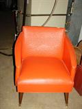 Dynamite orange vinyl chair