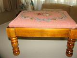Hand turned legs with needlepoint cover footstool