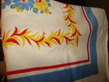 One of the vintage table cloths