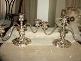 Ornate candlesticks in plate