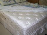 Queen size double pillow top mattress/box springs.