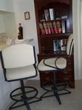 Super nice swivel metal bar stools with upholstery.
