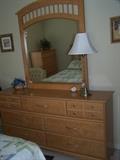 Bedroom set features dresser/mirror, headboard, chest of drawers, nite stand.