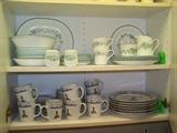 Top shelf:  Ivy Corelle dinnerware.  Bottom shelf:  Lighthouse dinnerware.
