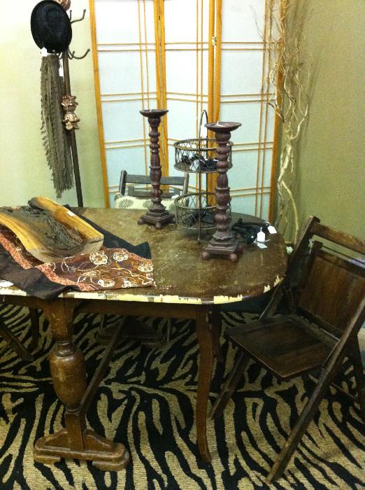 rugs, vintage tables & folding chair; hat rack; room divider; metal display baskets; candle sticks;