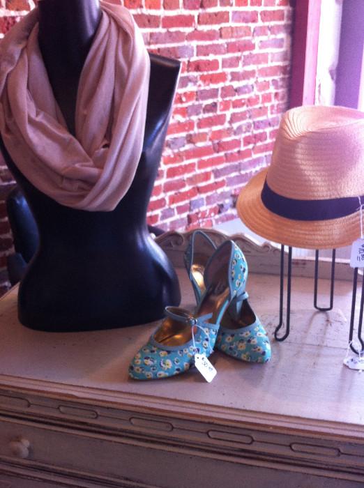     mannequins; scarves; shoes; hats; hat display; 