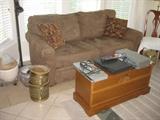 Taupe Sofa Sleeper and cedar lined storage chest with key