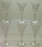 Close-up view, set of six EAPG cordial glasses.