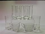 Depression glass clear line cut sugar and creamer. Set of tumblers (iced tea size) with cut quatrefoil (4-petalled) motif.