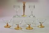 Cambridge gold encrusted bud vase with overall floral etch. Pair of antique hollow stemmed crystal glasses with miter and notched cuts. Set of four sorbet/sherbet dishes with clear bowls and amber bead stems.