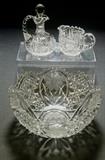 Selection from cut glass-cruet, creamer and floral patterned bowl.