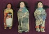 Selection from  vintage dolls-skookums, native American dolls with papoose, Kewpie, more.