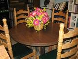 Table with 1 leaf and 4 chairs