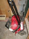 Rototiller, 6 ft. ladder, gas can, etc.