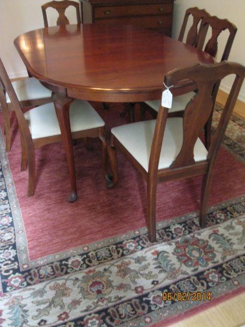 Solid Cherry dining table w/ leaves, pads, six chairs. Wool rug from Graffis, 8 1/2' x 10'