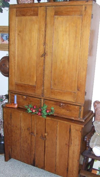Primitive pine stepback cupboard.