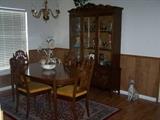 Dining room table 6 chairs, china cabinet.  Dog statue is not for sale.