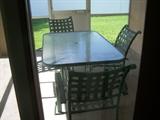 Glass top patio set